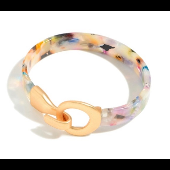 Resin bangle bracelet featuring hook and eye closure. - Picture 3 of 3